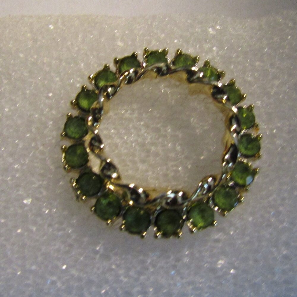 Very vintage DOUBLE CIRCLE PIN Gold tone with Pale Green Peridot Stones